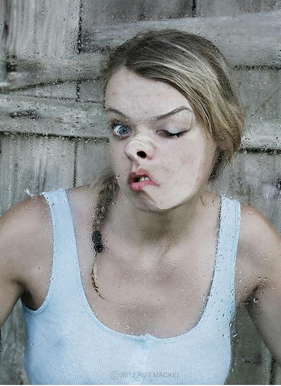 People's Faces Pressed Against Glass (8)