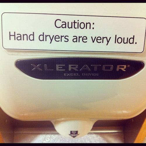 18 Completely Unnecessary Warning Labels Pleated Jeans